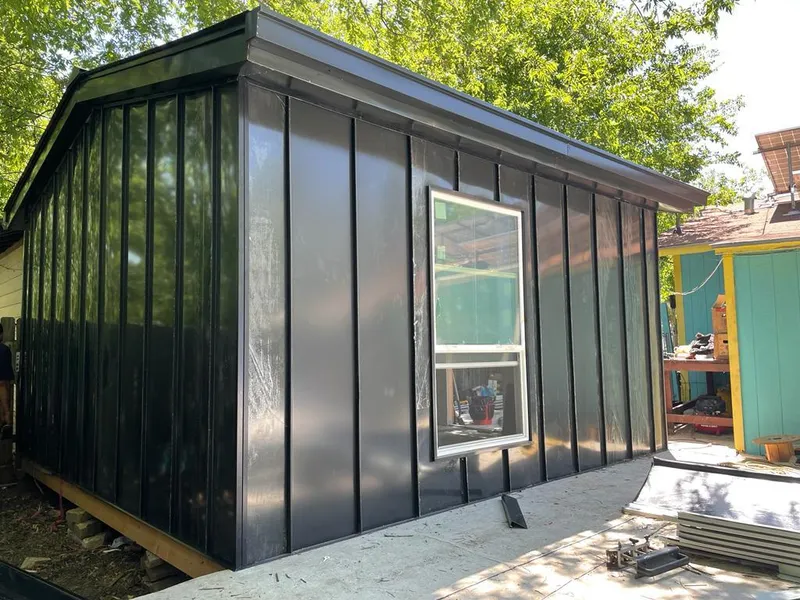 Black standing seam metal wall panels for Metal Roof Installation in Jenks