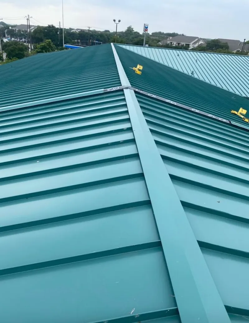 Green commercial metal roof ridge and valley for Metal Roof Repair in Jenks